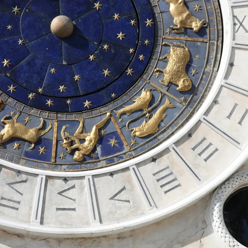 Pisces astrology symbol on a zodiac clock, Pisces season crystal and ritual guide