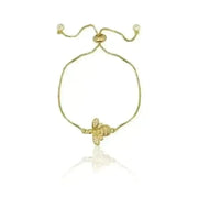 Gold turtle bracelet on a white background