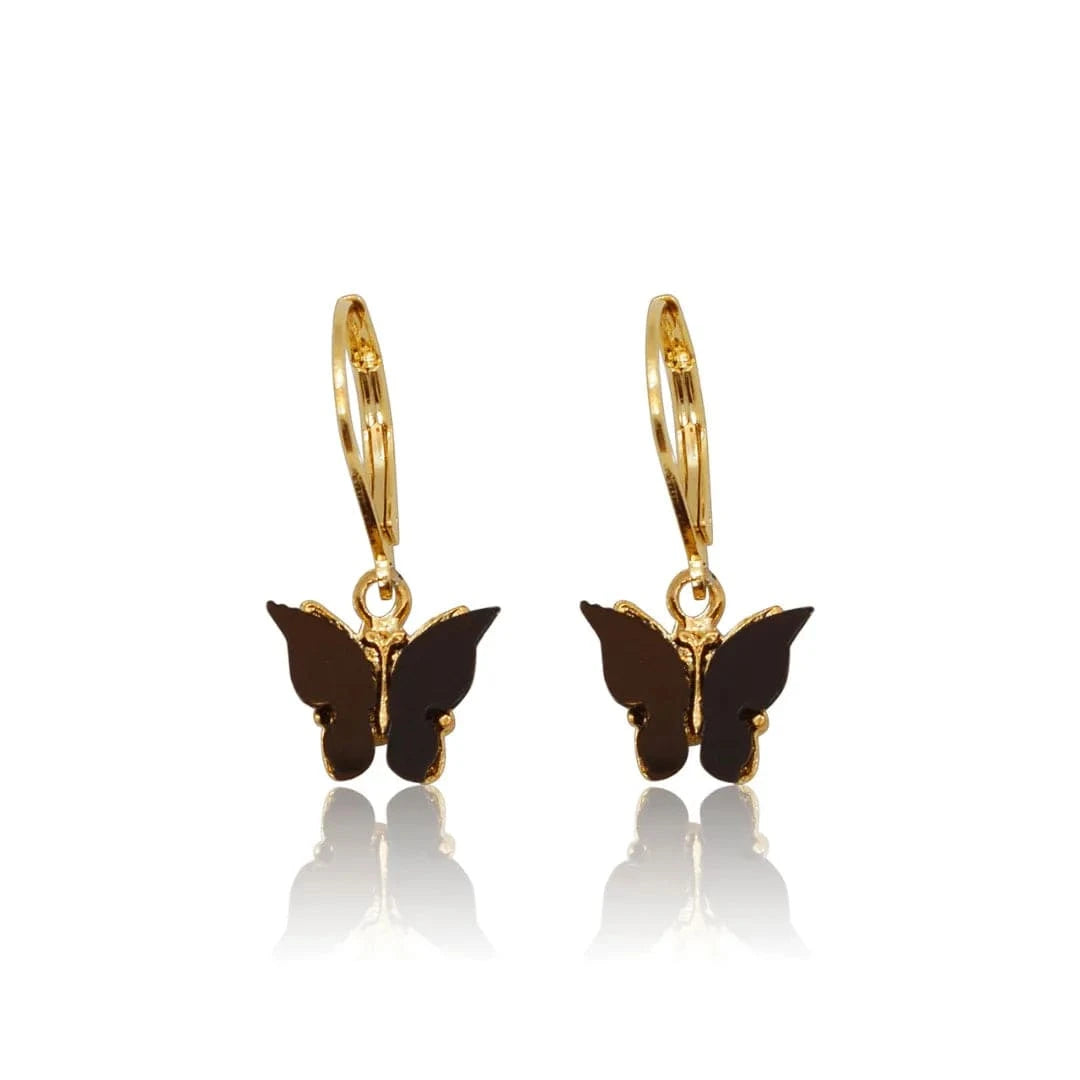 Gold hoop earrings with black butterfly charms on a white background