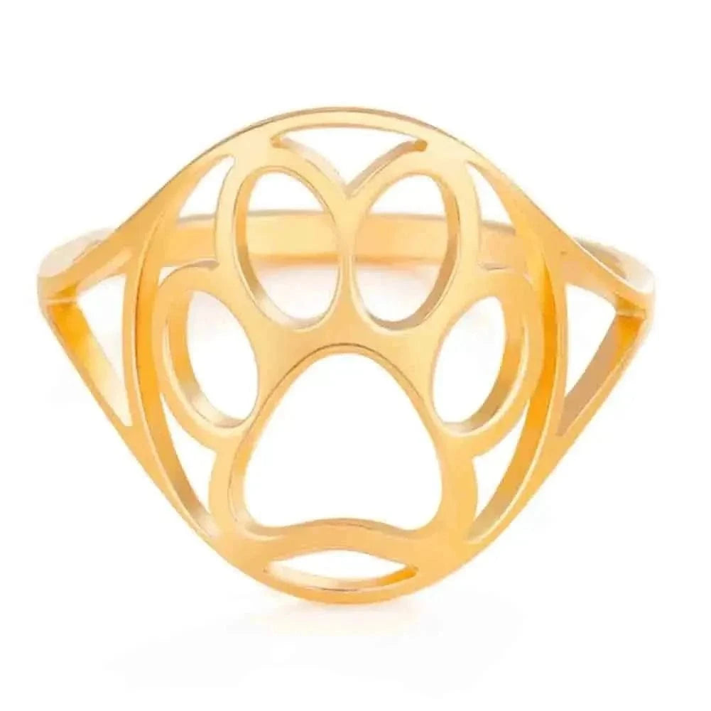 Gold ring with geometric design on a white background