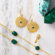 green medallion earrings in gold with emerald green chain necklace