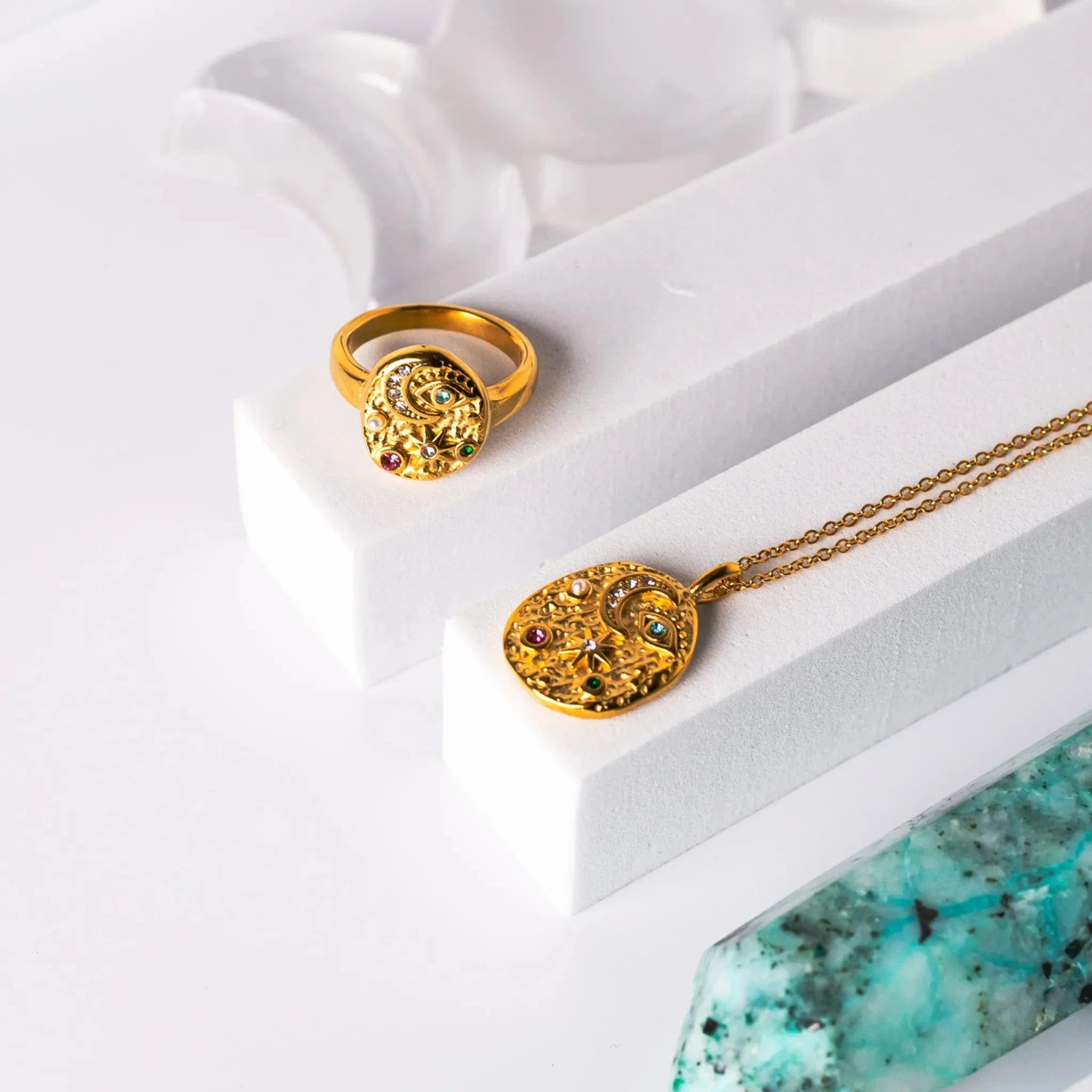gold crescent moon necklace and matching ring with third eye and stars