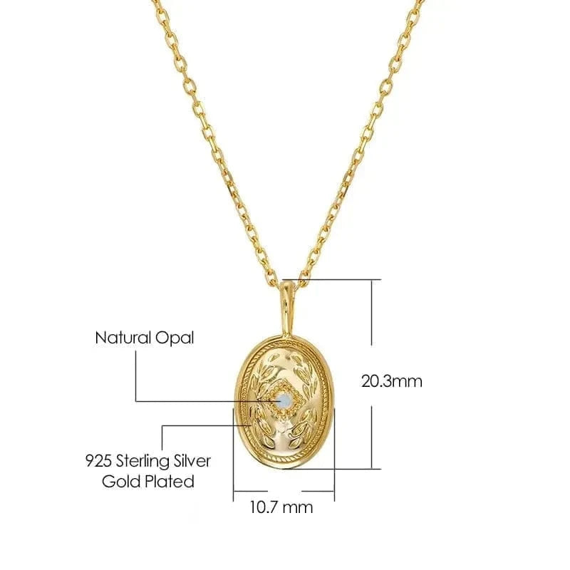 Gold pendant necklace with measurements on a white background