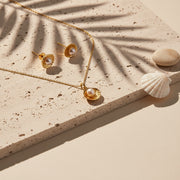 pearl in shell necklace