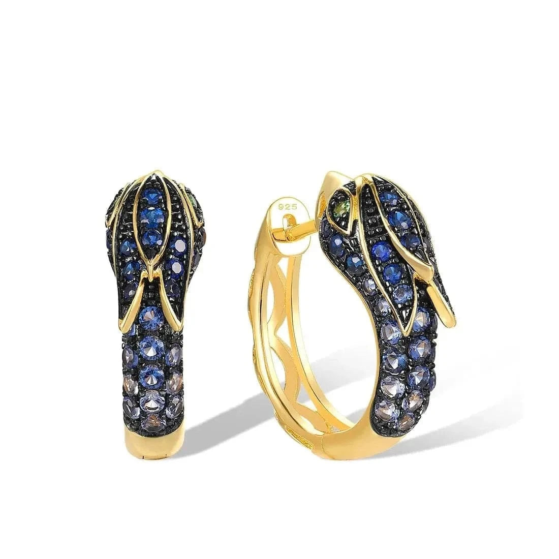 Gold earrings with blue gemstones on a white background.