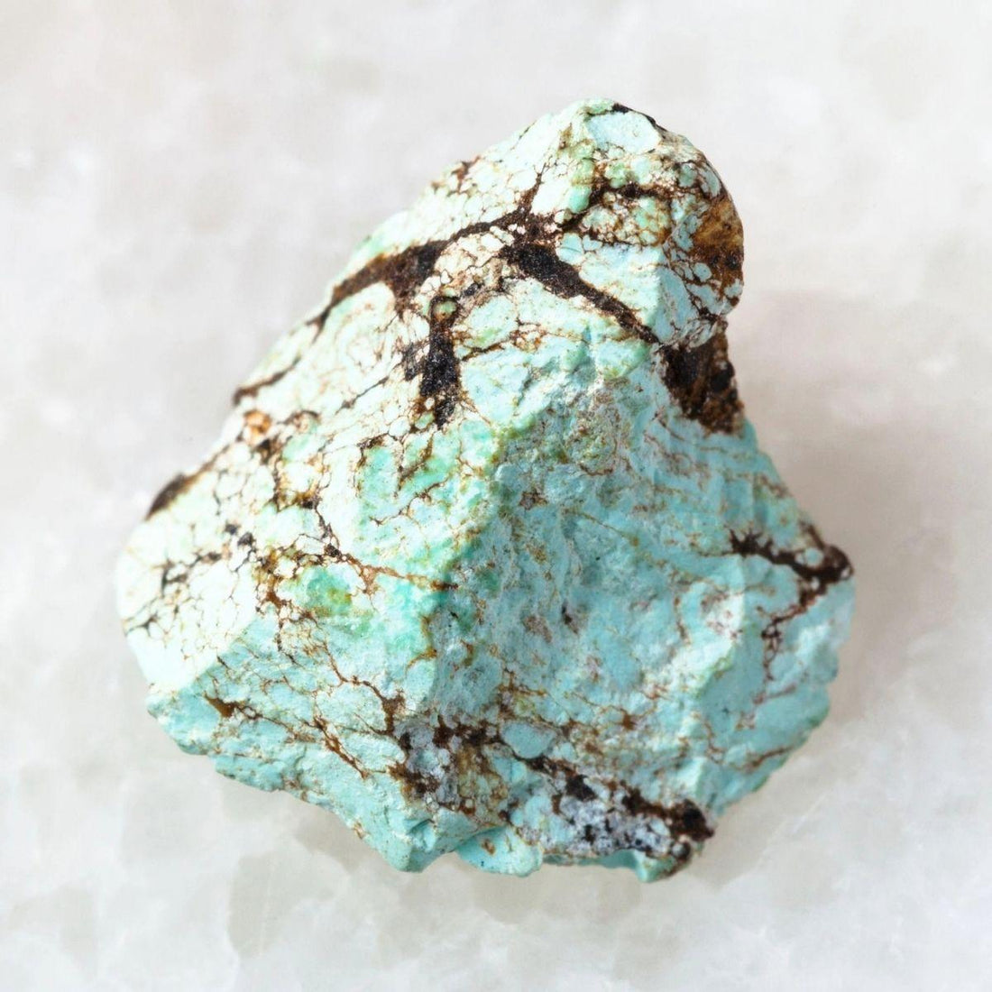 Raw blue-green turquoise — the December birthstone