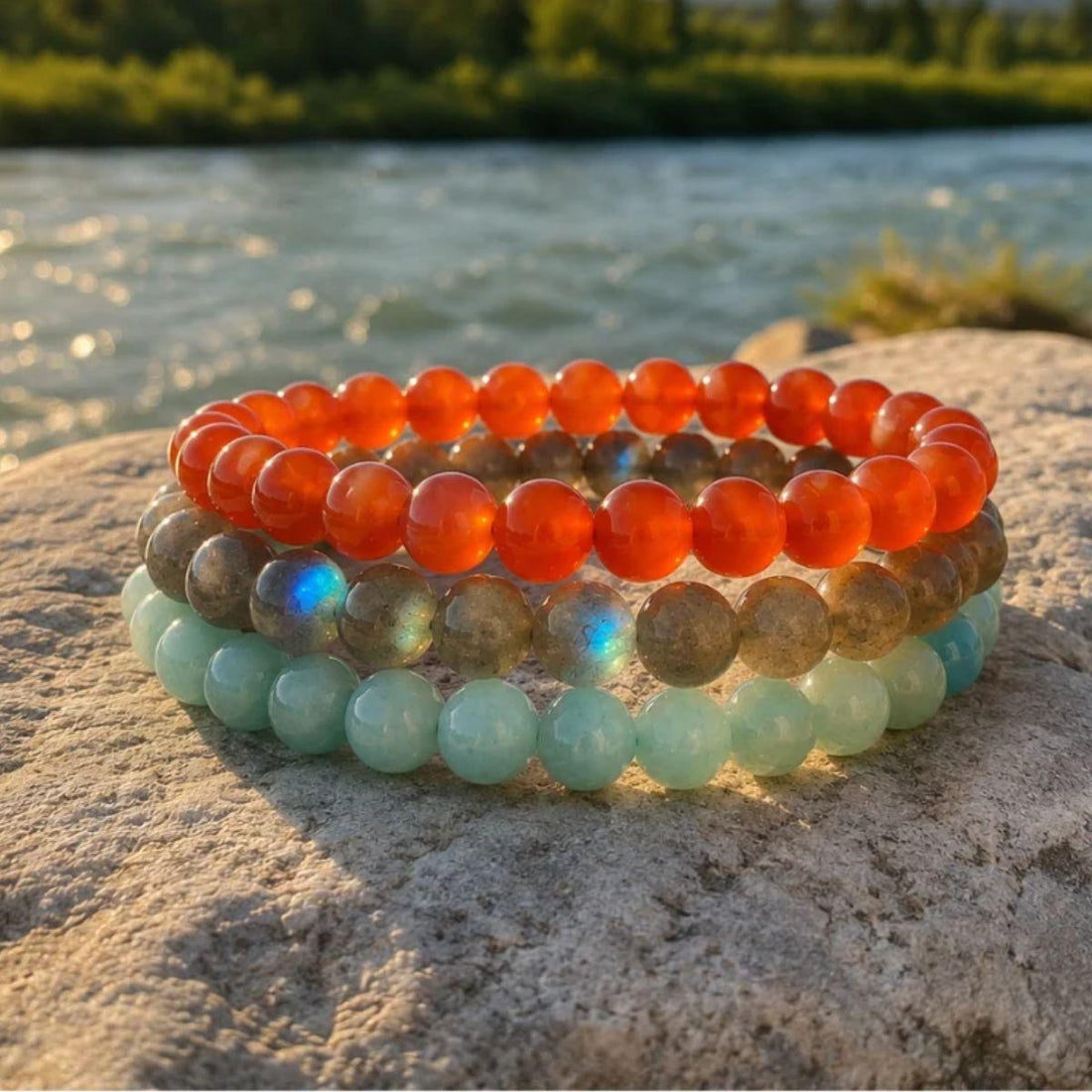 Stack of red and white crystal bracelets styled for Canada Day