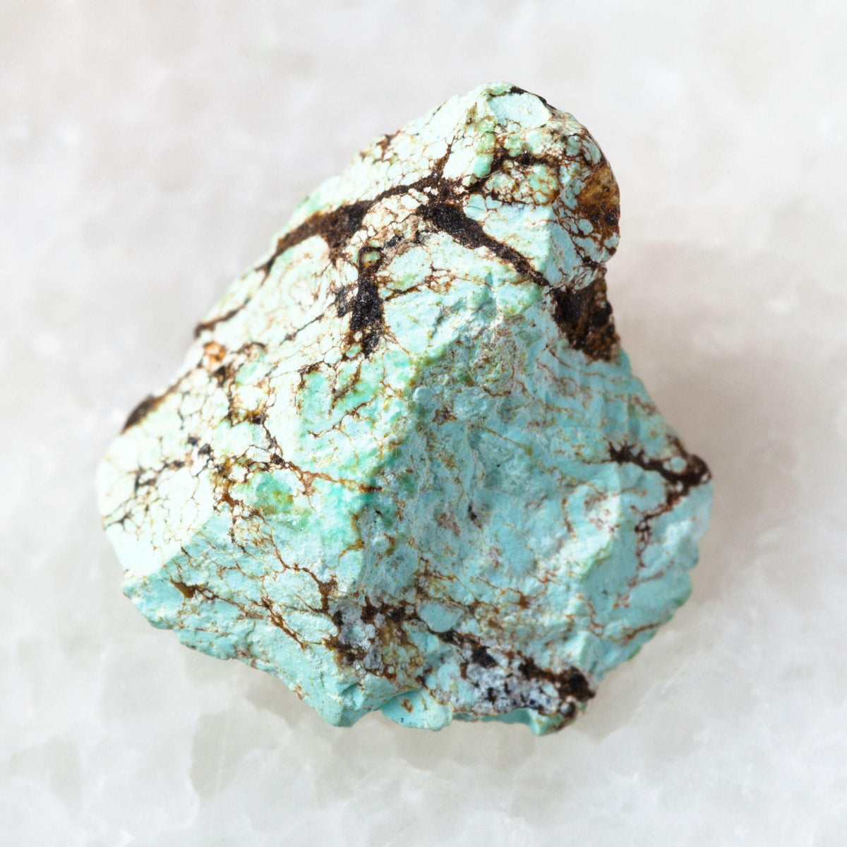 Turquoise — the December birthstone, raw blue-green stone