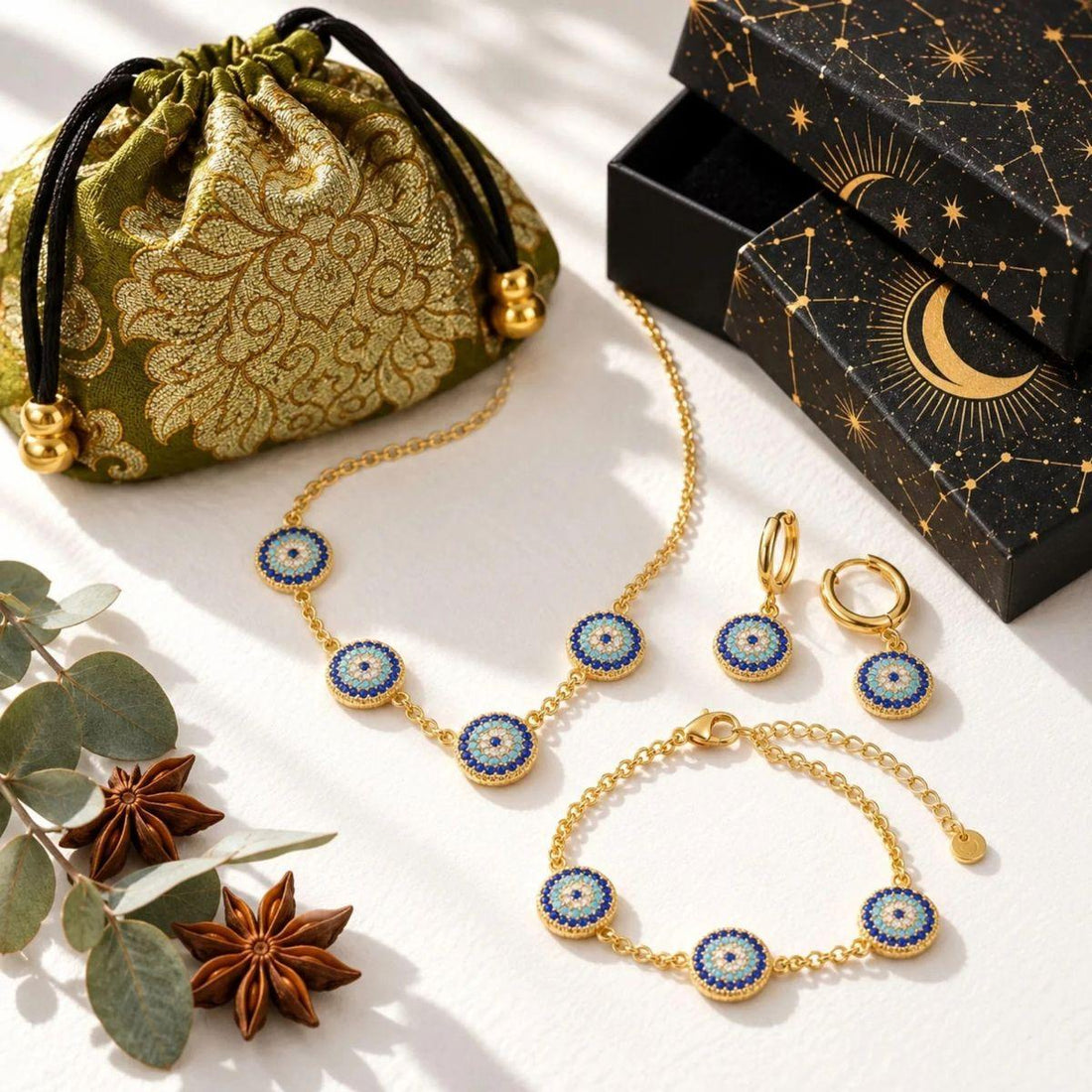 Blue evil eye jewelry with the Mystic Soul gift bag and celestial box — gifts chosen by symbol, not by price