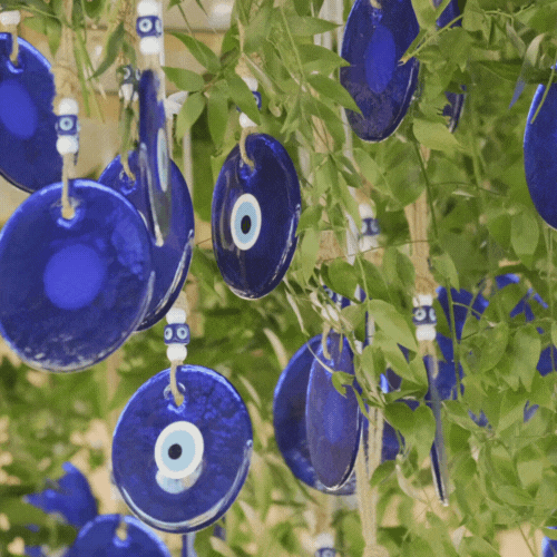 third eye wind chimes hanging in tree