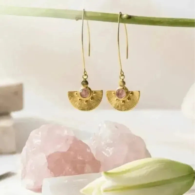 Labradorite crystal jewelry collection — necklaces, bracelets, and earrings on warm neutral background, Mystic Soul Jewelry handmade Calgary