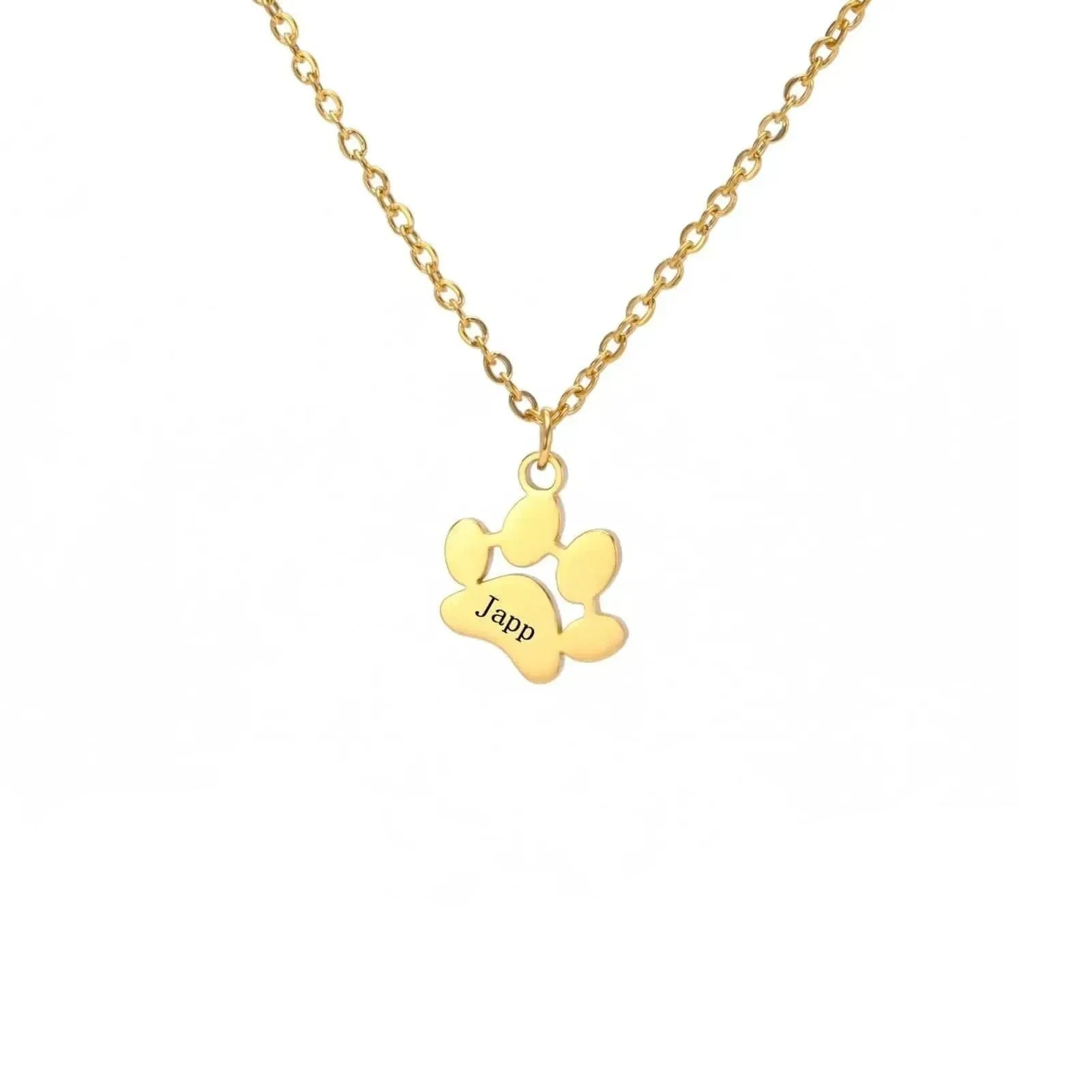 Gold necklace with a paw-shaped pendant on a white background