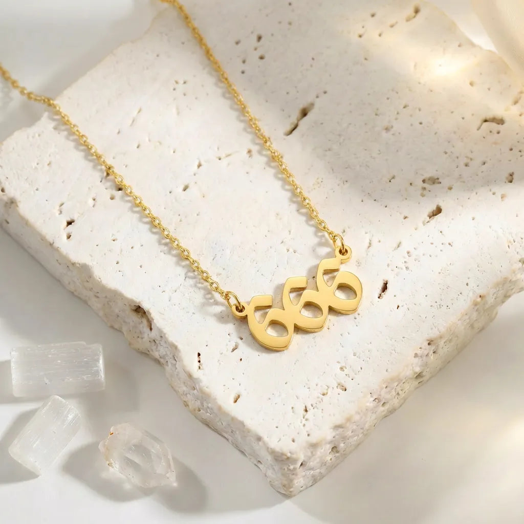 666 Gold angel number pendant necklaces — stainless steel on white background