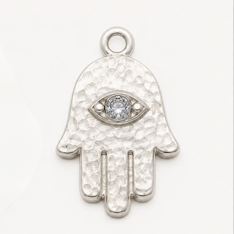 Hamsa charm detail showing the open palm and eye