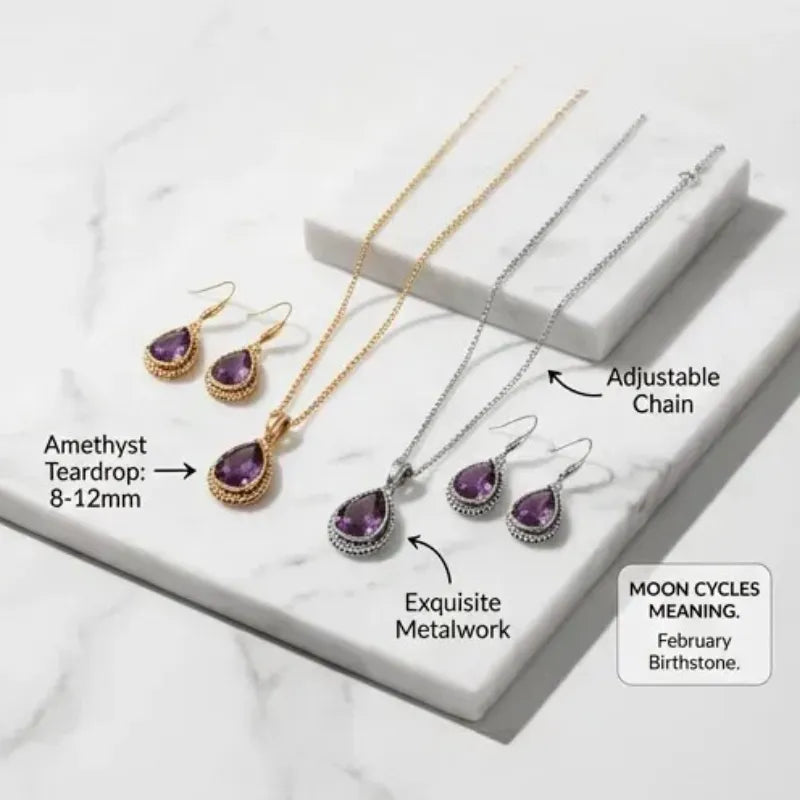Jewelry set with amethyst teardrop pendants on a marble surface