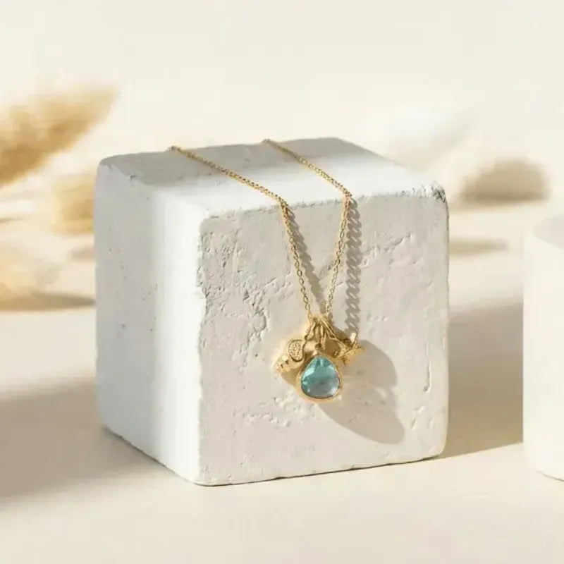 Aqua blue mini drop shell necklace in gold, March birthstone ocean charm jewelry