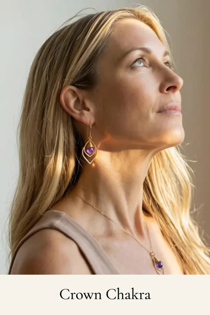 Woman wearing earrings with a neutral background