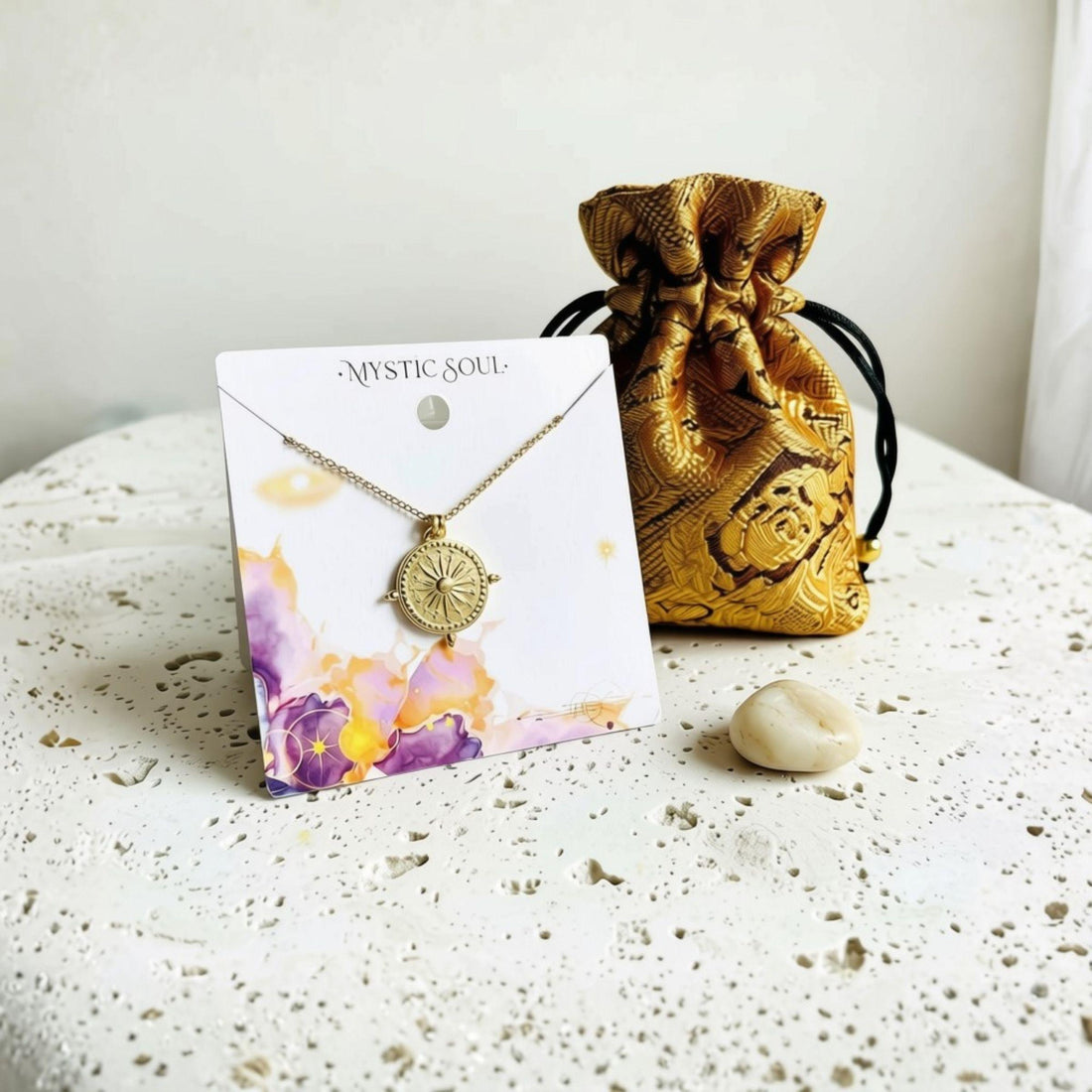 Sun Medallion necklace with a teal satin jewellery pouch — meaningful gifts under $75