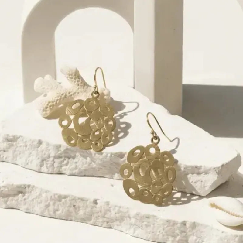 Bubble drop earrings shown on display