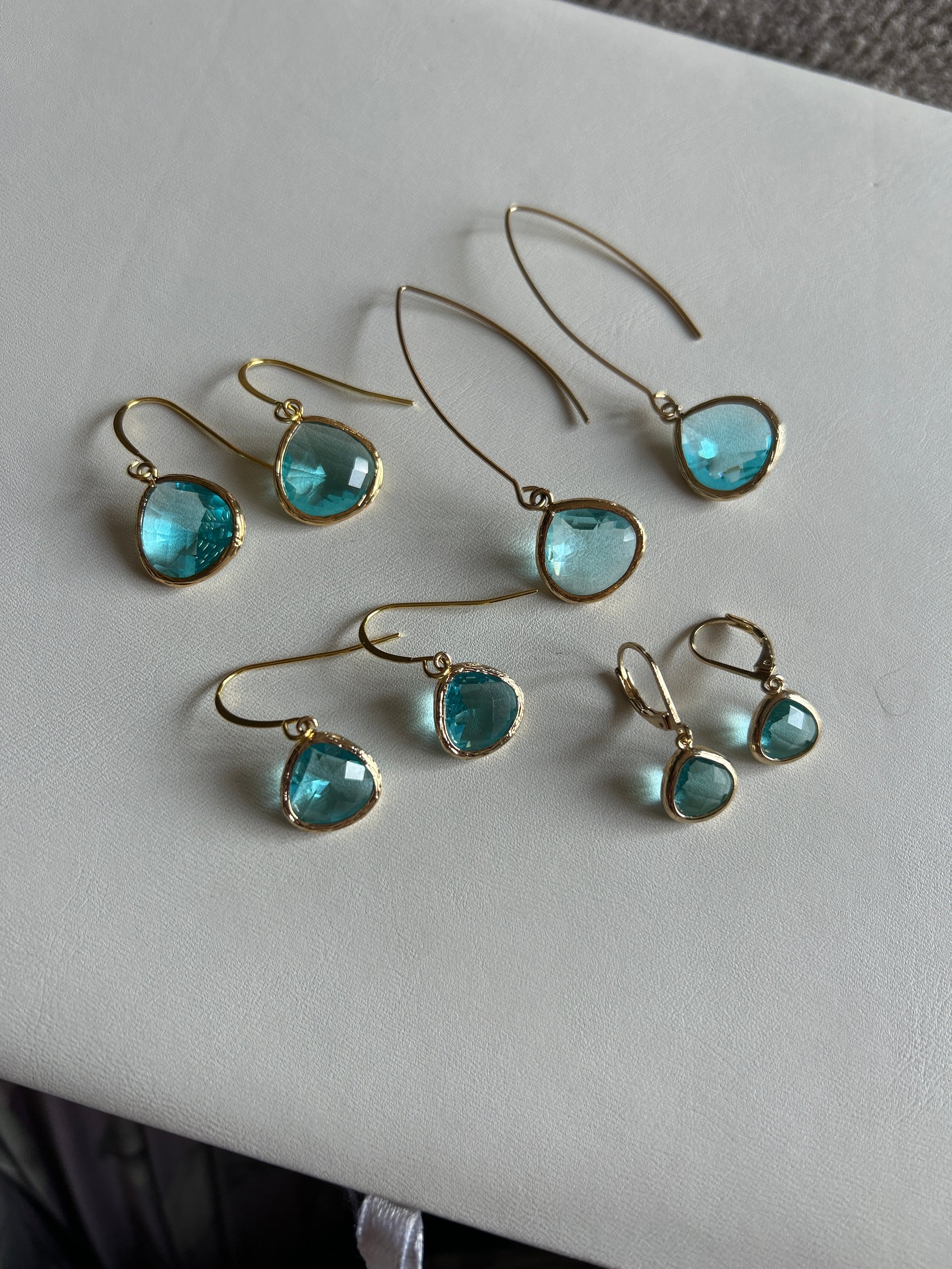 Aqua Elegant Pebble earrings with faceted ocean-blue glass