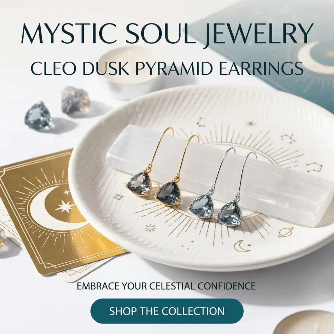 Mystic Soul Jewelry Cleo Dusk Pyramid earrings on a decorative plate with celestial design
