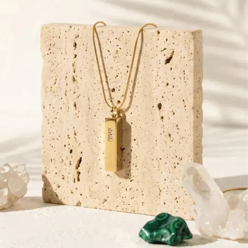 Gold crystal encrusted vial necklace — spiritual symbol jewelry for keepsakes and intention
