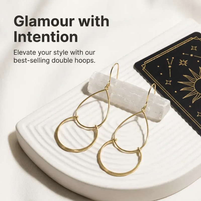 Gold hoop earrings on a white dish with text 'Glamour with Intention' and 'Elevate your style with our best-selling double hoops.'.