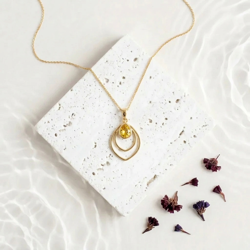 Gold Double Teardrop necklace with a citrine yellow faceted glass drop, November birthstone colour