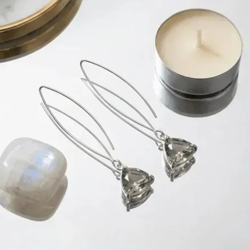 Silver plated Dusk Cleo drop earrings with smoky grey glass triangles