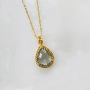 Gold plated Dusk Exquisite necklace with a smoky grey faceted glass pendant