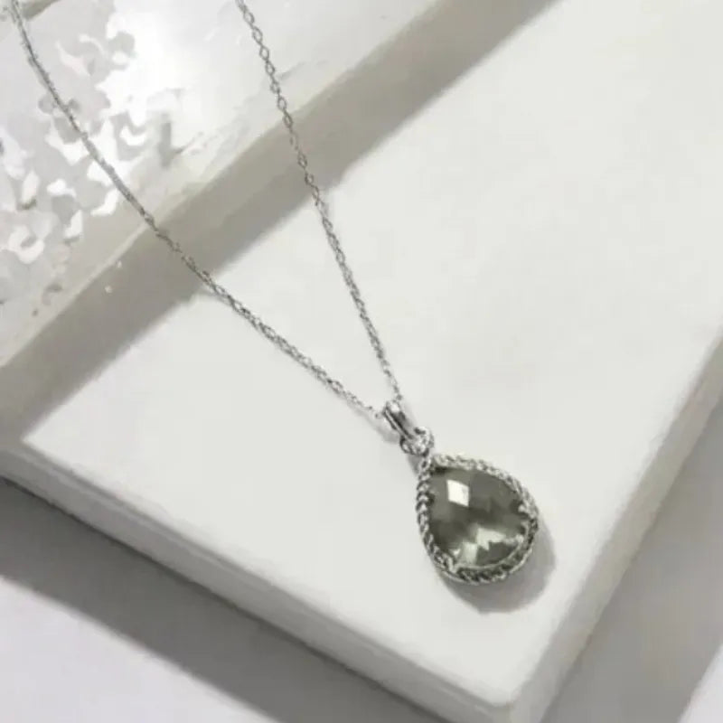 Silver plated Dusk Exquisite necklace with a smoky grey faceted glass pendant