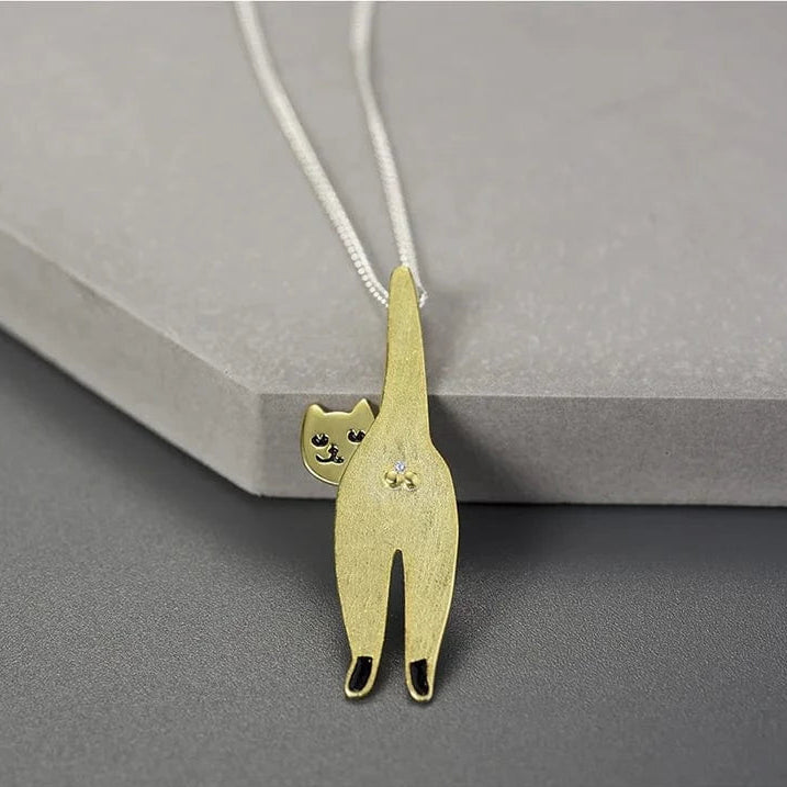 Gold Cat Necklace on grey background