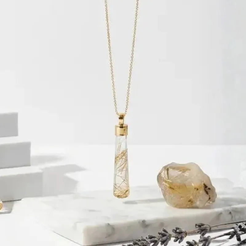 Golden rutilated quartz pendulum necklace — focused light, timeless minimalism