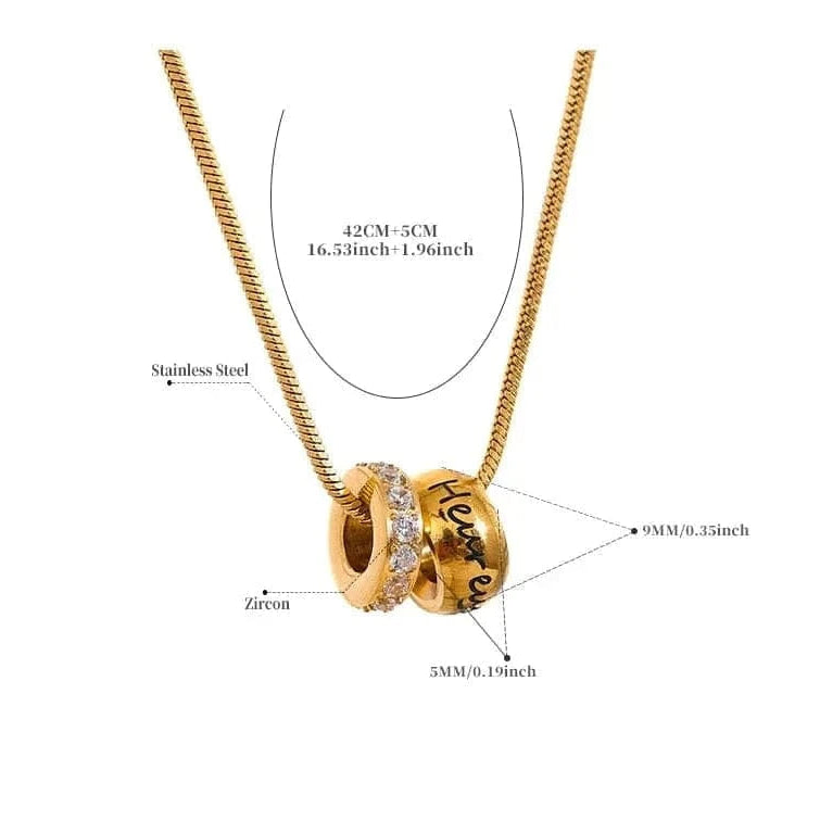 Gold necklace with pendant on a white background