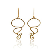 Gold earrings with intricate designs on a white background