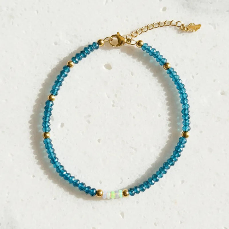 kyanite and moonstone beaded bracelet with gold spacers — one-of-a-kind crystal jewelry for calm