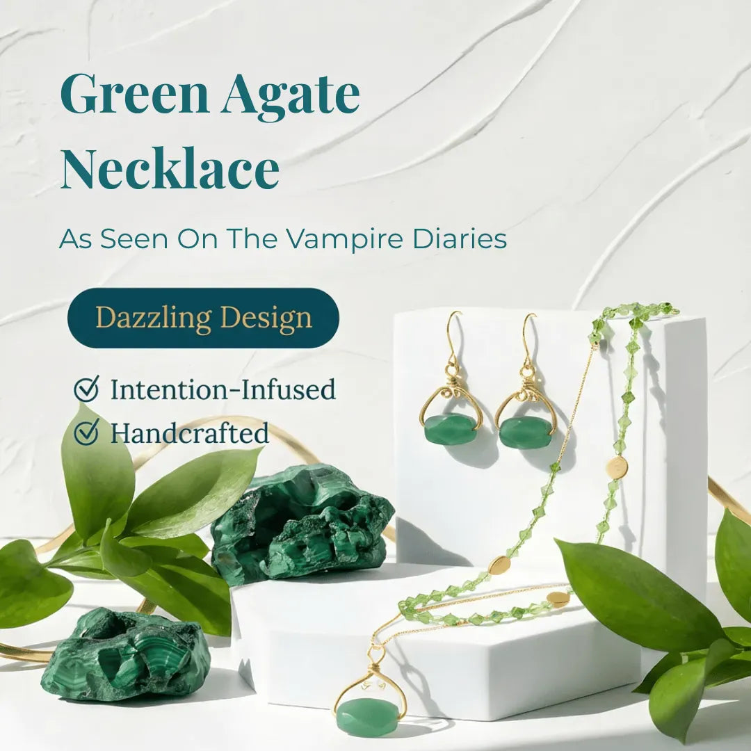 Green Agate Necklace with earrings on a white stand, surrounded by green leaves.