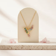 Colorful gold hummingbird pendant with crystals — spirit animal jewelry for joy
