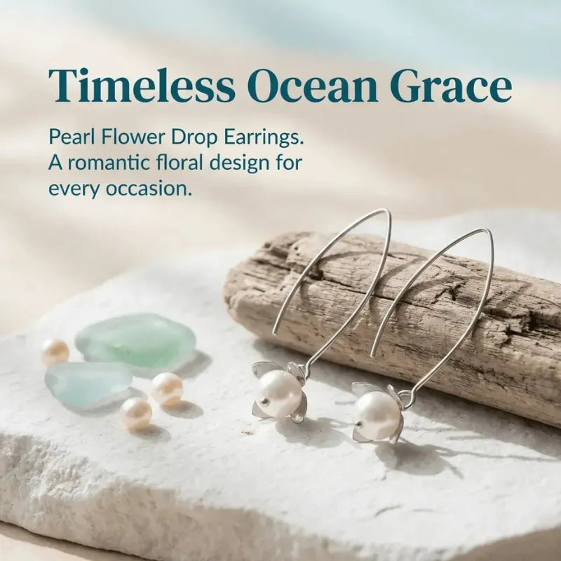 Pearl flower drop earrings on a beach setting with text 'Timeless Ocean Grace'.