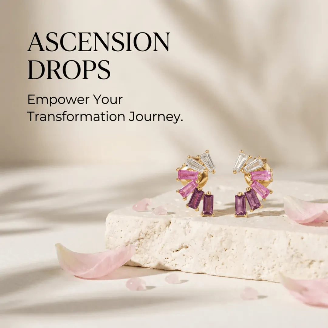 Earrings with pink gemstones on a beige background, featuring text 'ASCENSION DROPS Empower Your Transformation Journey.'