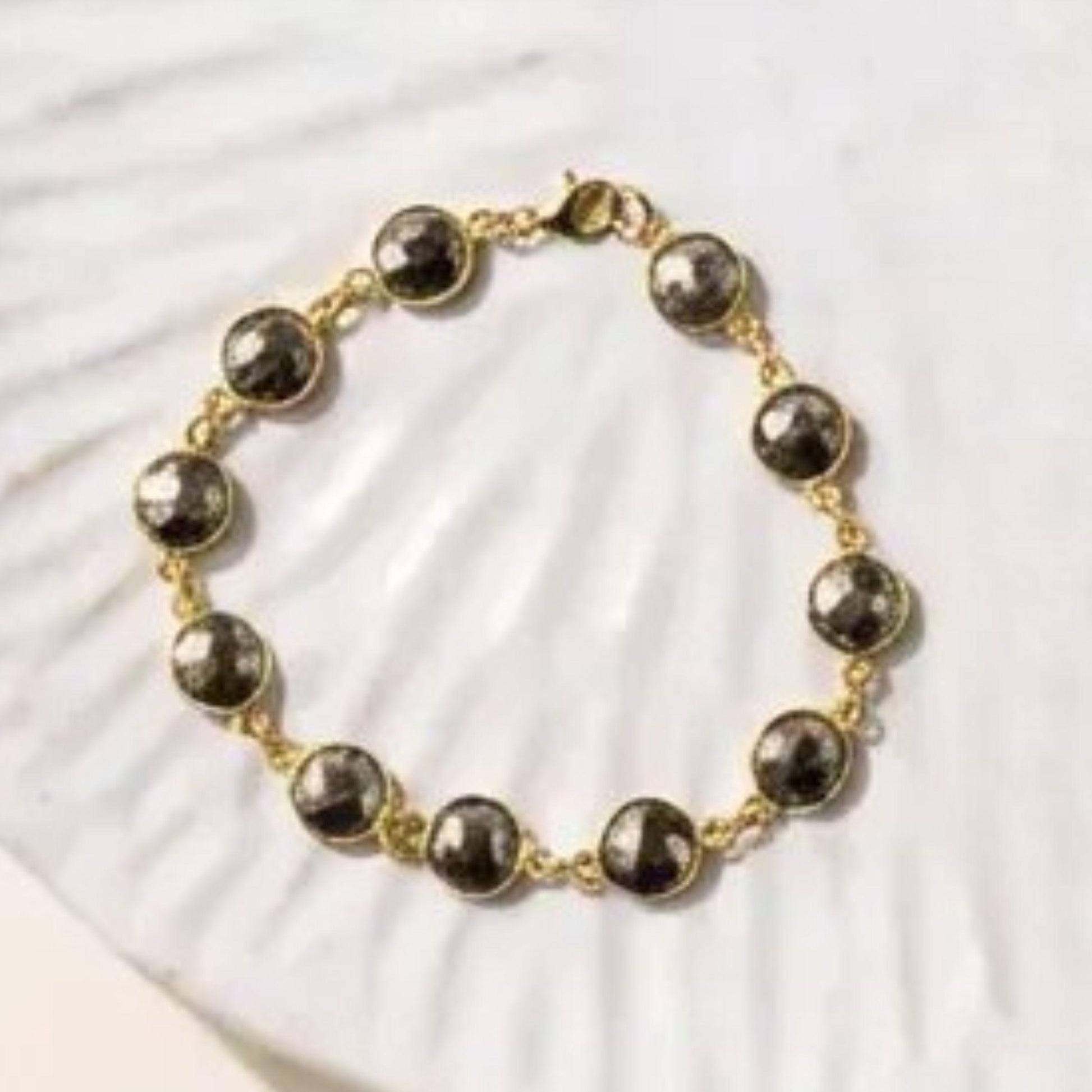 Pyrite gemstone necklace and bracelet detail — gold plated manifestation jewellery