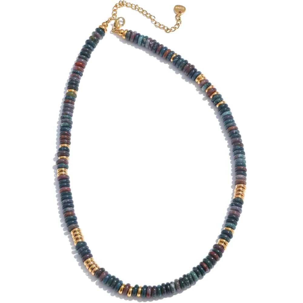 Necklace with multicolored beads and gold accents on a white background