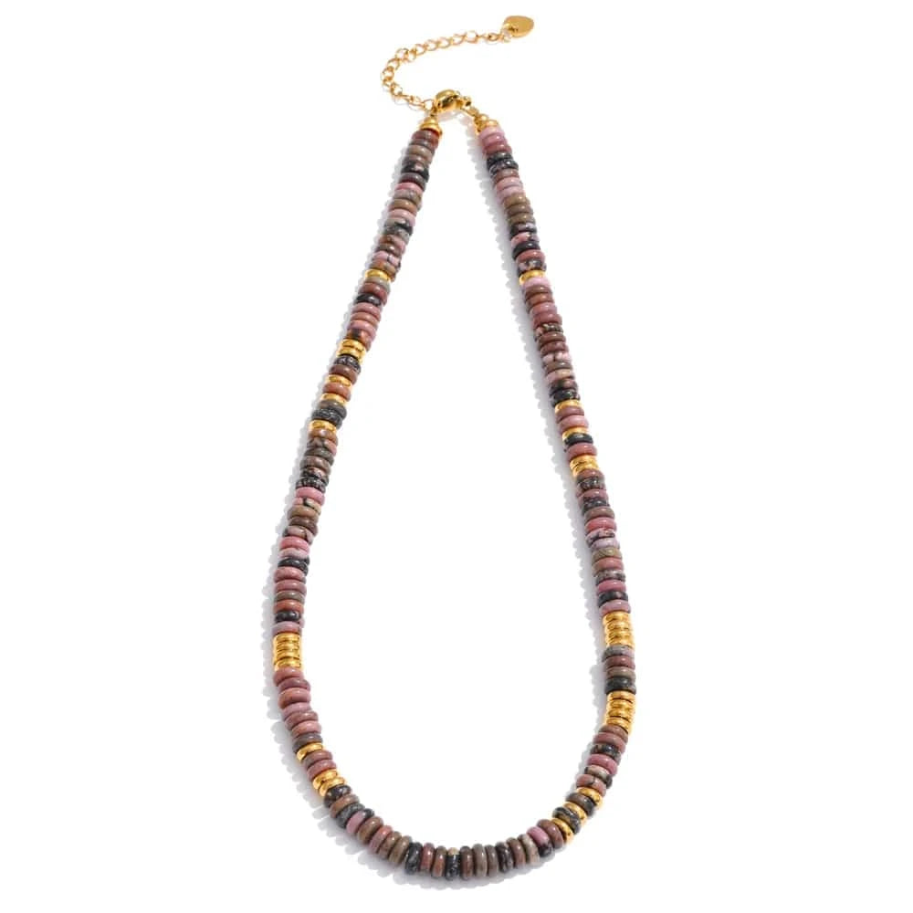 Necklace with multicolored beads and gold accents on a white background