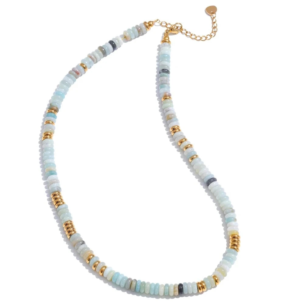 Necklace with multicolored beads and gold accents on a white background