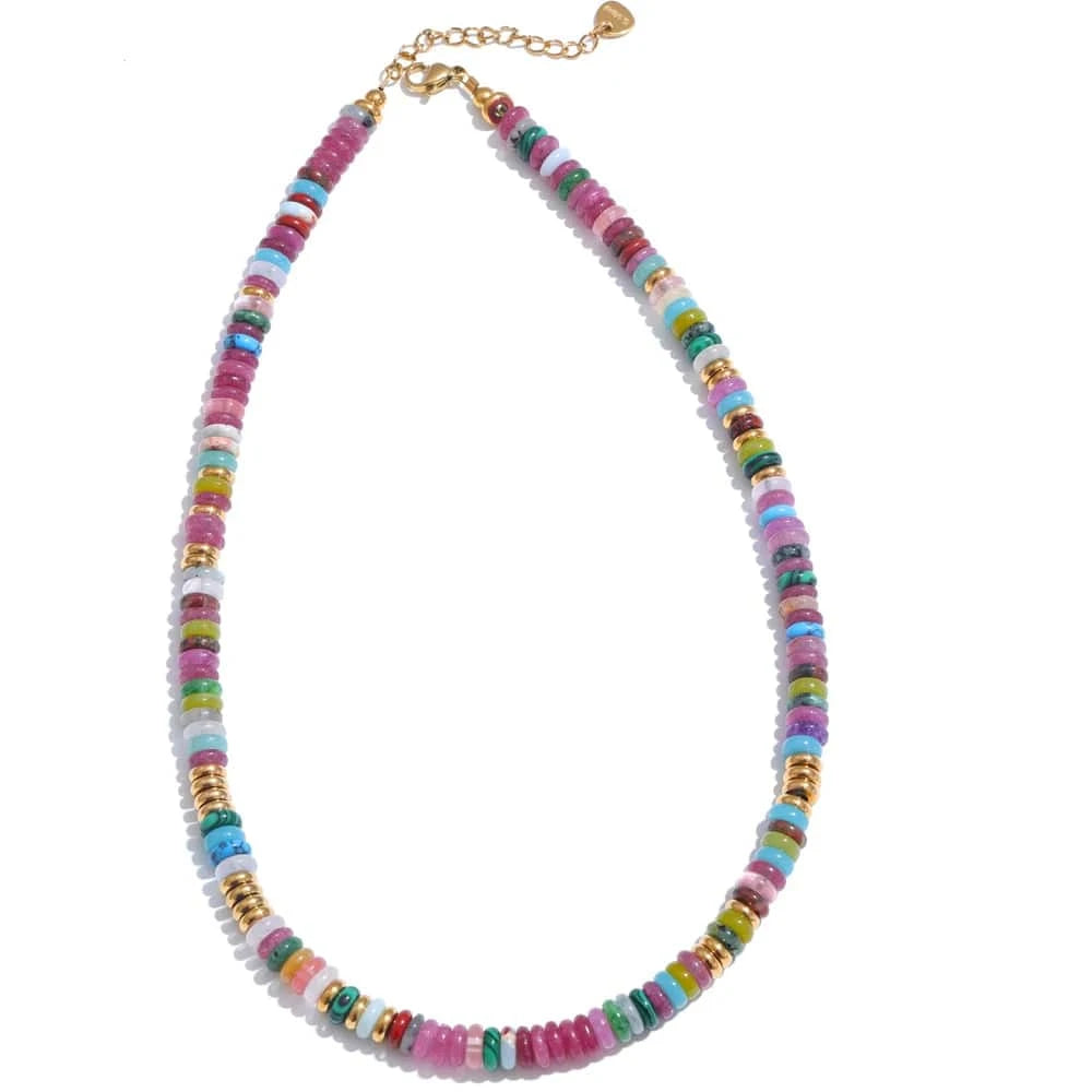 Colorful beaded necklace with a gold chain on a white background