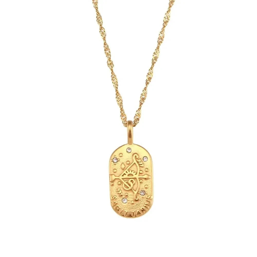 Gold pendant necklace on a white background