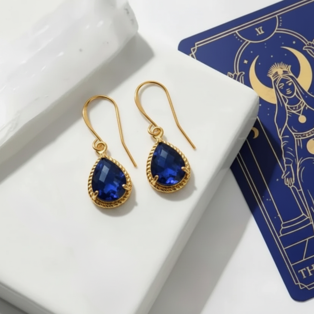 Sapphire blue exquisite teardrop earrings in gold, September birthstone jewelry
