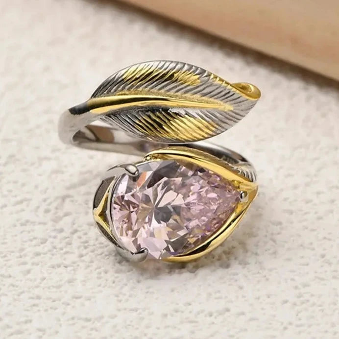 Feather cocktail ring with pink gemstone