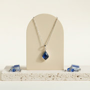 Selene sapphire pendant necklace in silver, hanging view