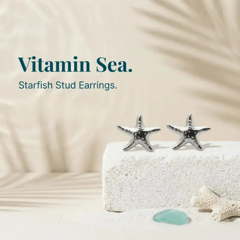 Starfish stud earrings on a textured surface with 'Vitamin Sea' branding.